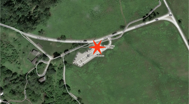 Aerial view of Knoxs Quarters area with star in parking lot marking pick up drop off location