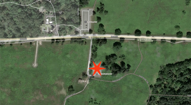 Aerial view of Maurice Stephens House with red star in the parking lot marking pick up drop off location