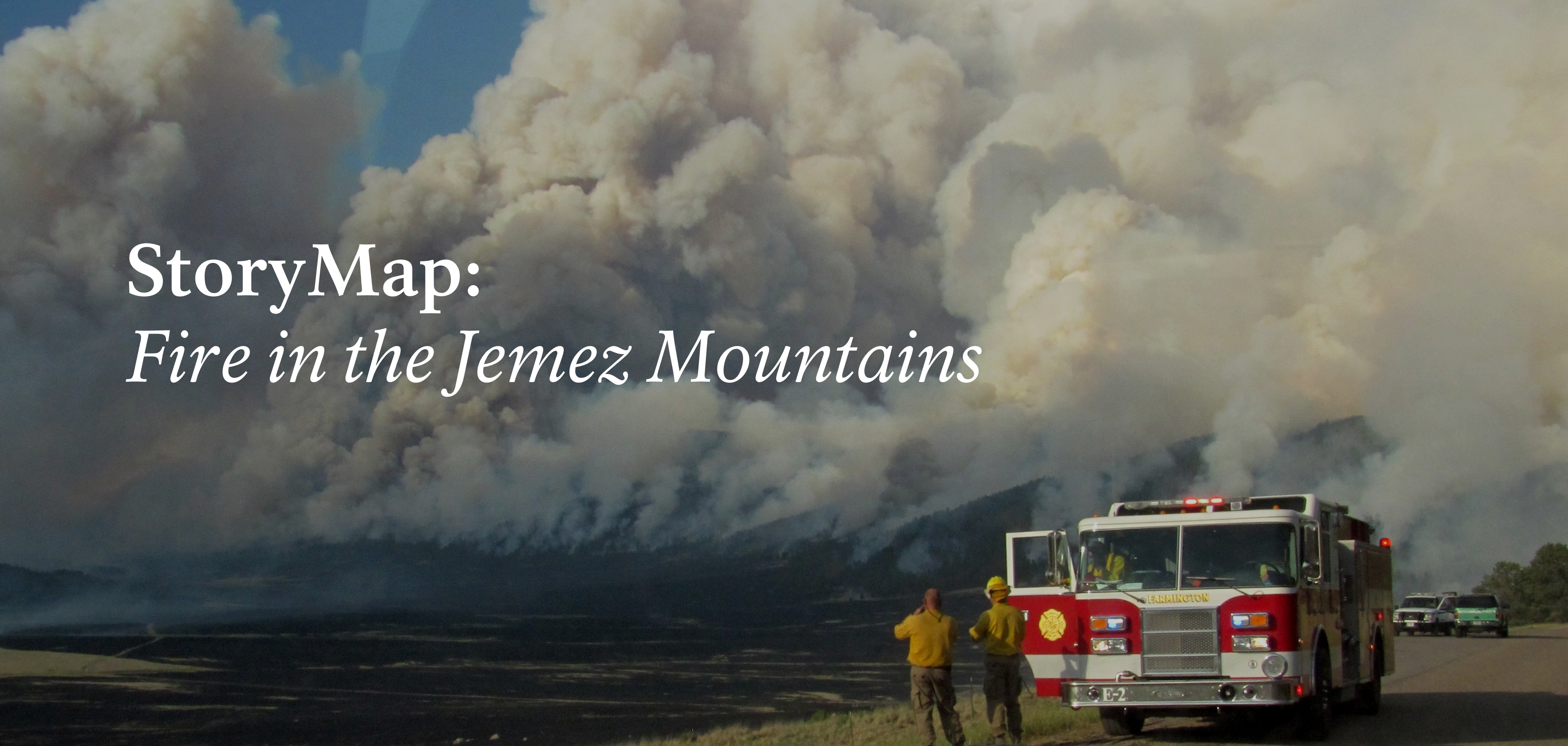 Firefighters stand next to a red fire engine, watching a massive wildfire burn a distant hillside. Text says "StoryMap: Fire in the Jemez Mountains."