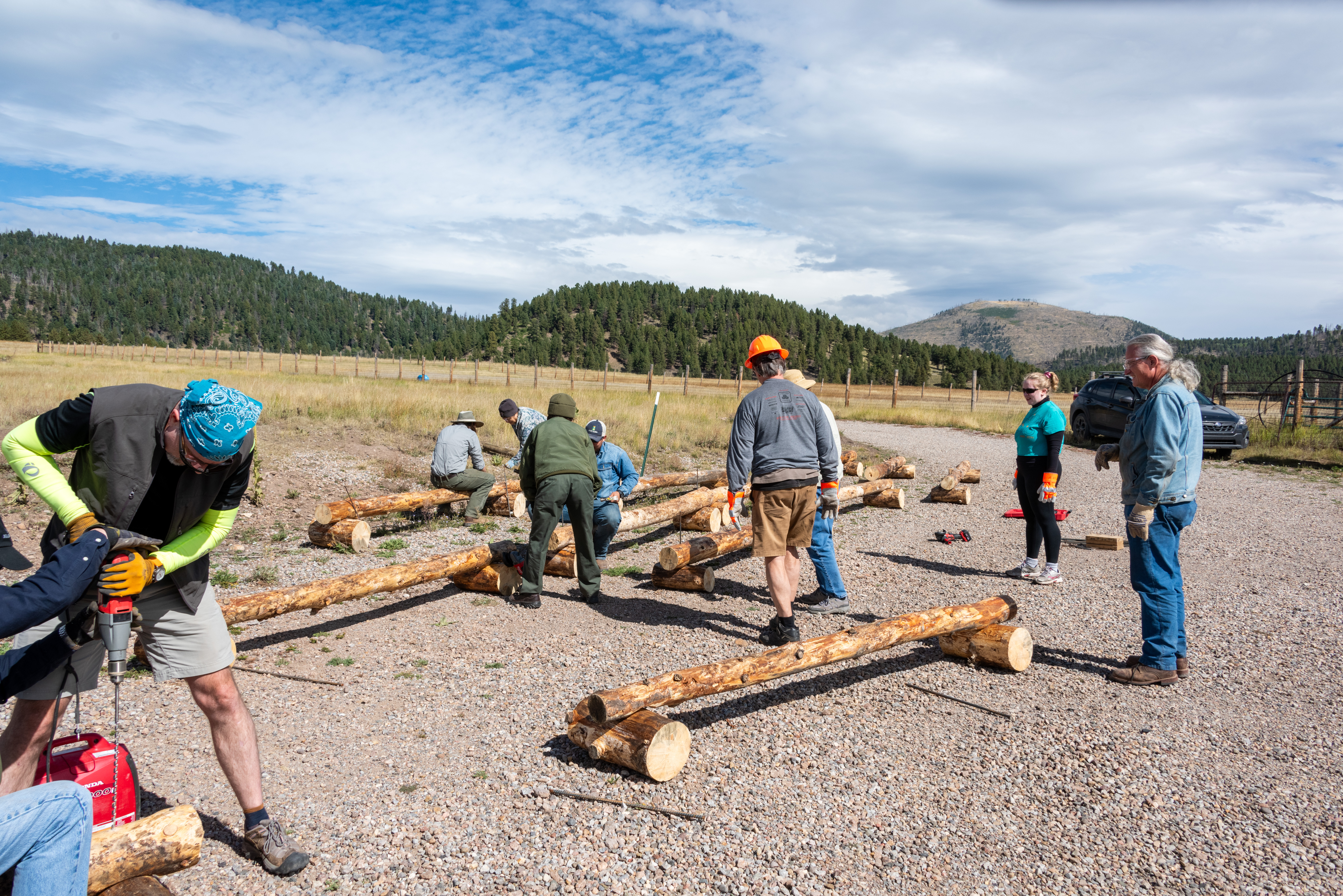 Constructing bumper logs Volunteers and rangers constructing bumper logs.
