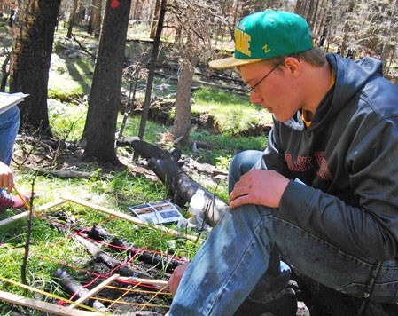 Student working on an project at Valles Caldera.