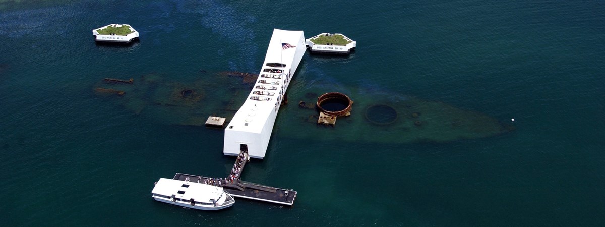 An aerial view of the USS Arizona and the memorial.