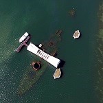 The USS Arizona and memorial, aerial view.