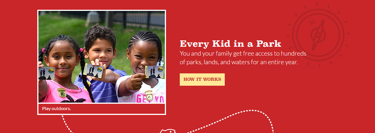 Kids hold up their Every Kid In A Park pass.