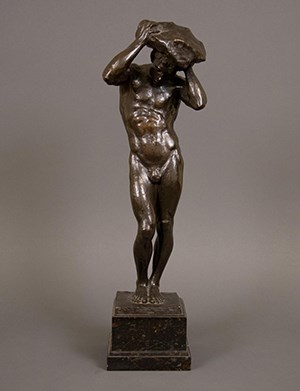 Bronze figure of a man.