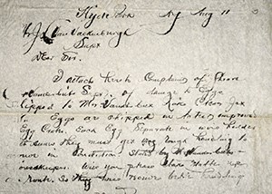 A document with script writing in ink.