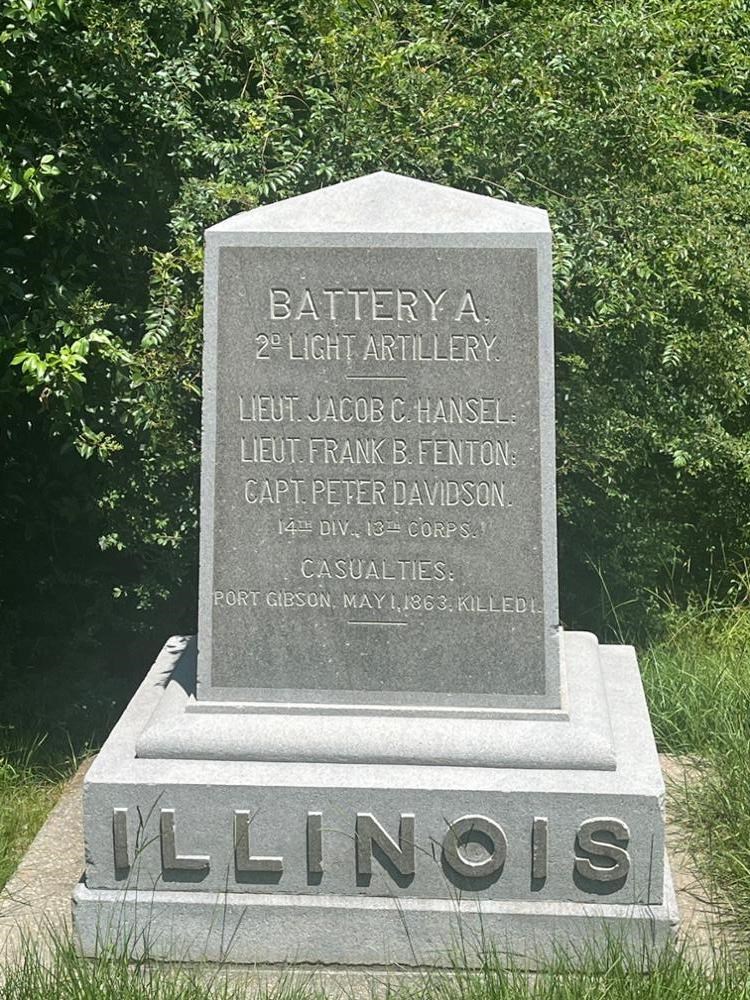 Square Rectangular stone monument with ILLINOIS written on its base