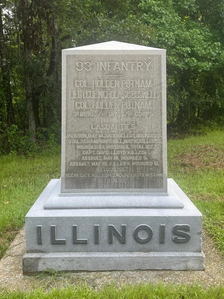 Square Rectangular stone monument with ILLINOIS written on its base