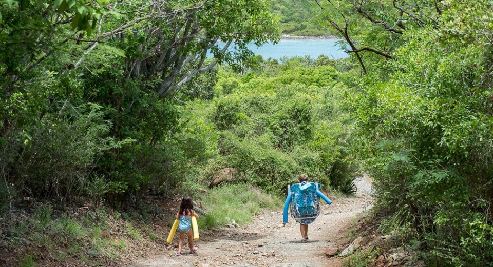 Two children walking down the path to Salt Pond for a great day at the beach. Two children walking down the path to Salt Pond for a great day at the beach.