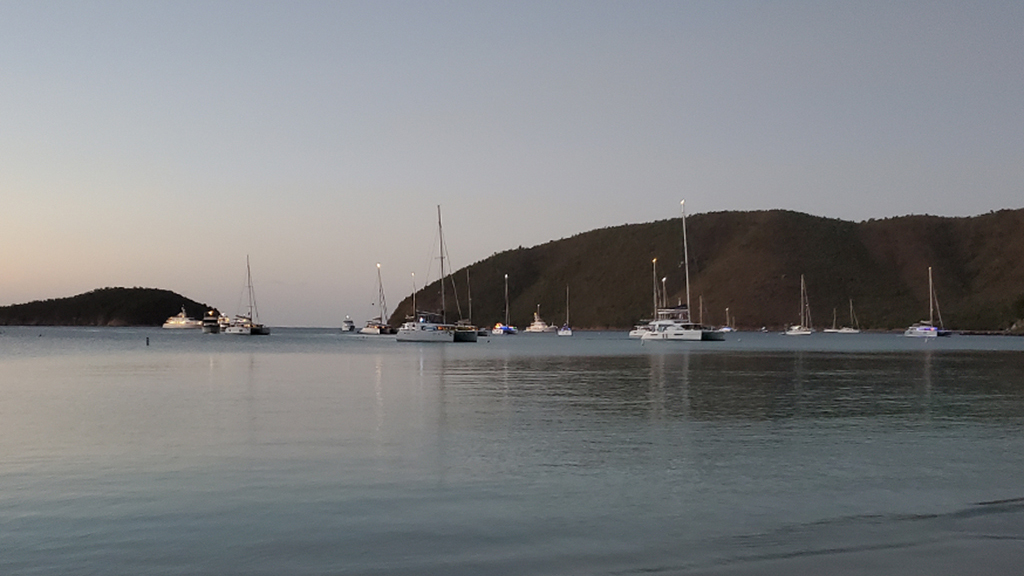 Vessels utilizing the NPS mooring system at Maho Bay. A group of approximately twenty boats using the NPS mooring system in Maho Bay.