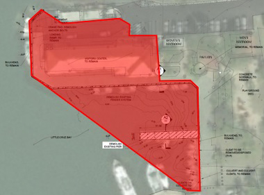 An aerial representation of the Cruz Bay Visitor Center area with the proposed construction zones around the headquarters, bulkhead, and finger pier highlighted in red.