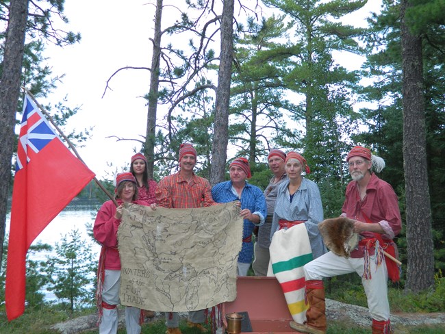 Image of people dressed as voyageurs