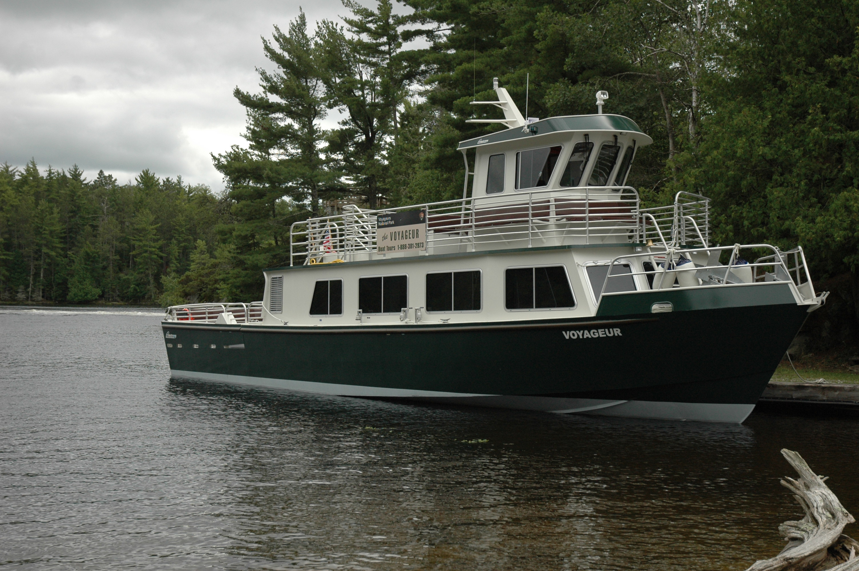 tour boat  on calm lake