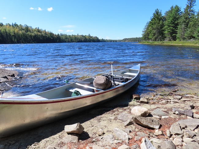 Canoe on the shore of B9 Locator Lake backcountry campsite
