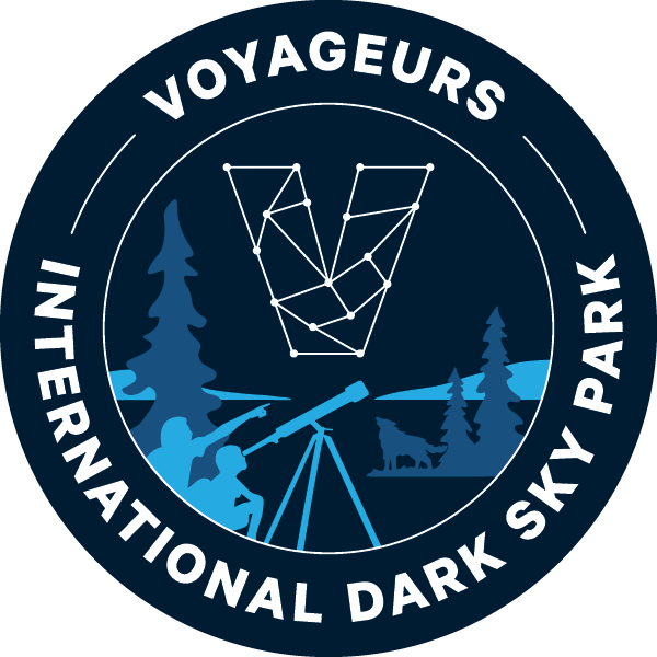 Voyageurs Dark Sky Logo