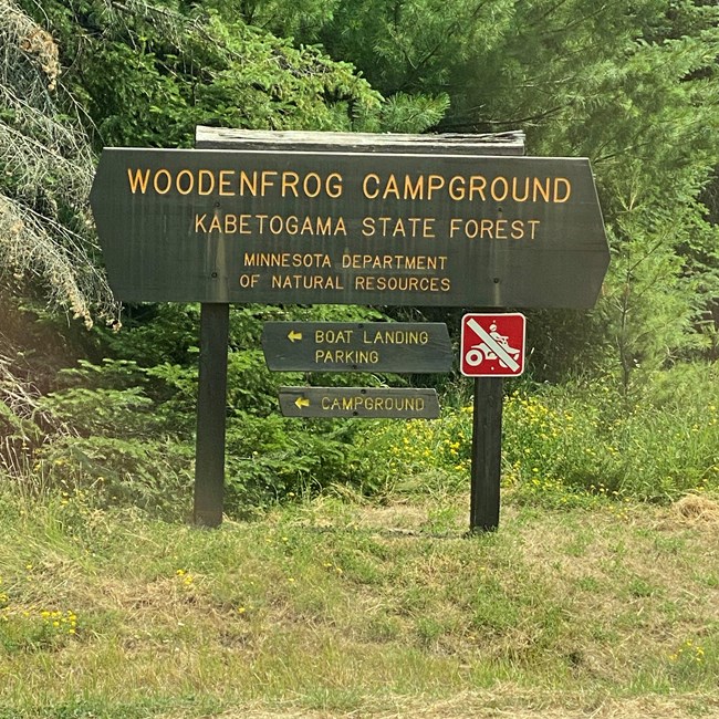 A campground sign outside the park