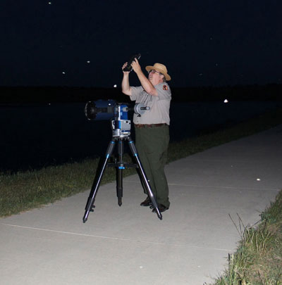 The "Dark" Ranger Don Yates setting up equipment for the Night Sky program.