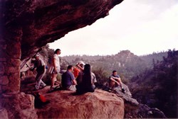 Visitors on a canyon ledge
