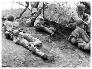 Forward observers of the 77th Division, U.S. Army, keep a constant watch over the progress of the troops on Guam.