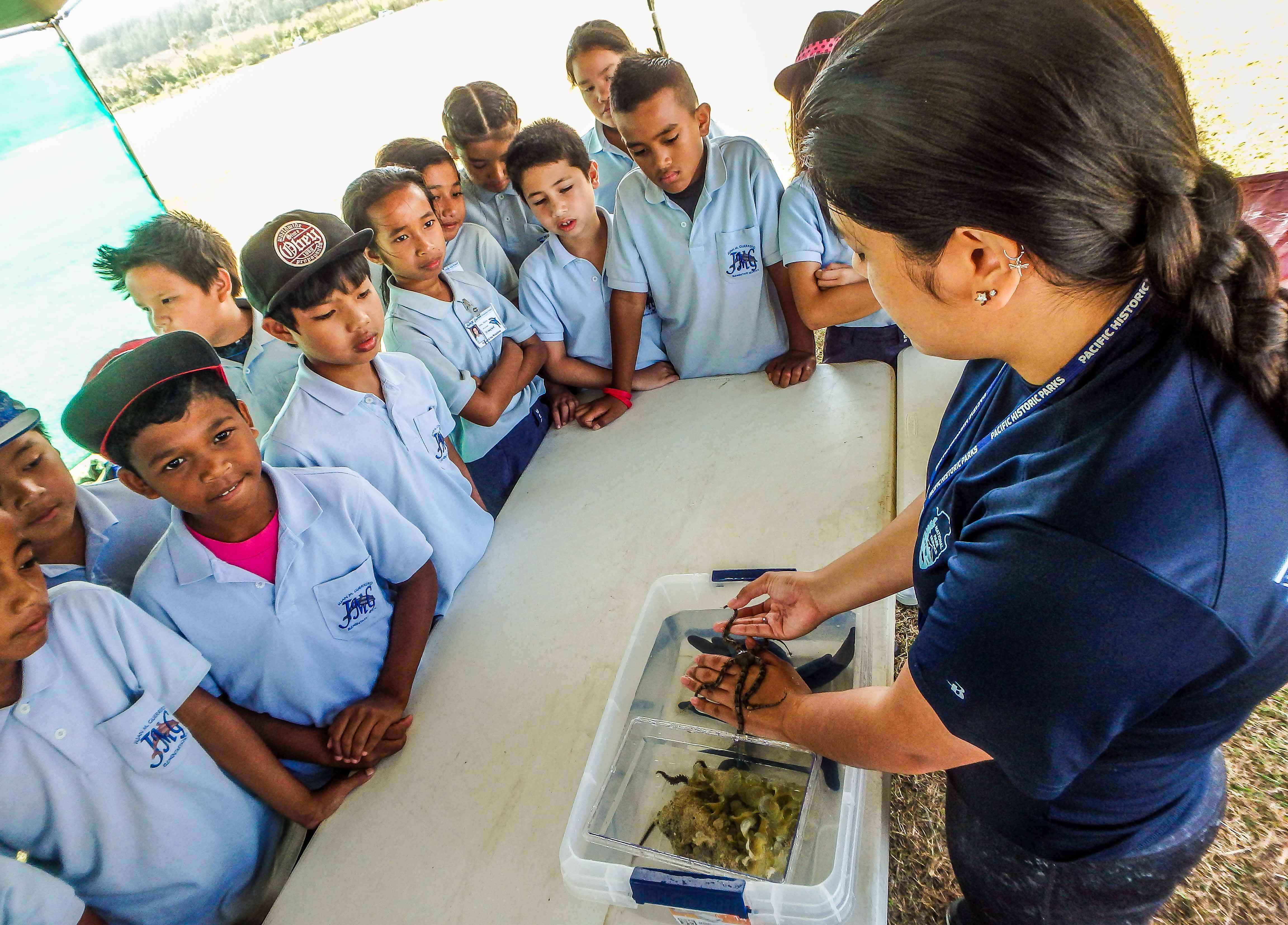 Fourth grade students from Juan M. Guerrero Elementary School enjoy a day at War in the Pacific National Historical Park