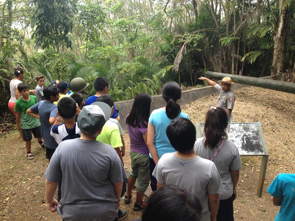 Ranger Rufus with school group tour at Piti Gun