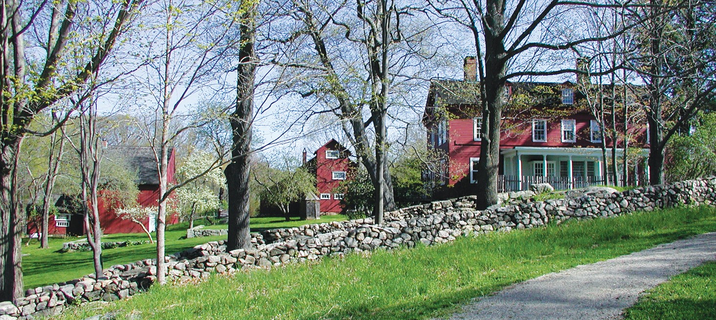Weir House and Studios Three red buildings - the Weir House, Weir Studio, and Young Studio, at Weir Farm NHP
