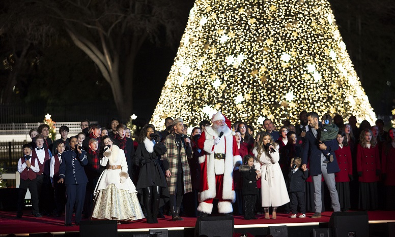 Spensha Baker, Colton Dixon, Chevel Shepherd, Tucson Arizona Boys Chorus, U.S. Air Force Max Impact, West Tennessee Youth Chorus, Jessie James Decker, Eric Decker, and Decker children join Santa Claus on stage for a final song.