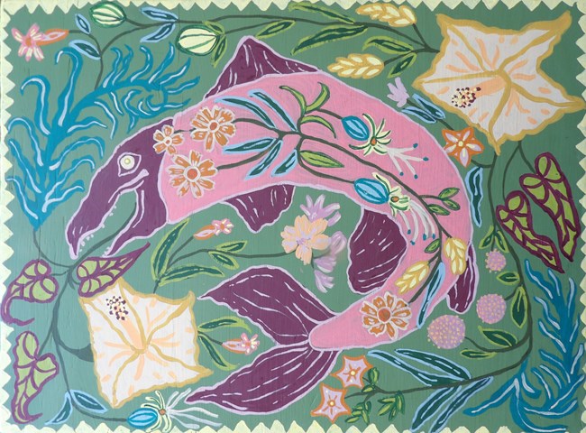 painting of pink salmon with purple head and tail and fins. Flowers of multiple colors surround and inside salmon.