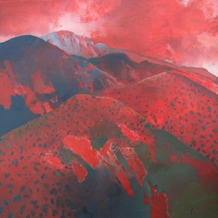 Mountains in red and dark gray with red sky colors.