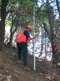 NPS Fire Ecologist monitoring a prescribed burn unit.