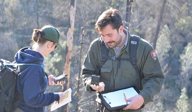 Park Archeologist John Fable entering archeological data on his GPS.