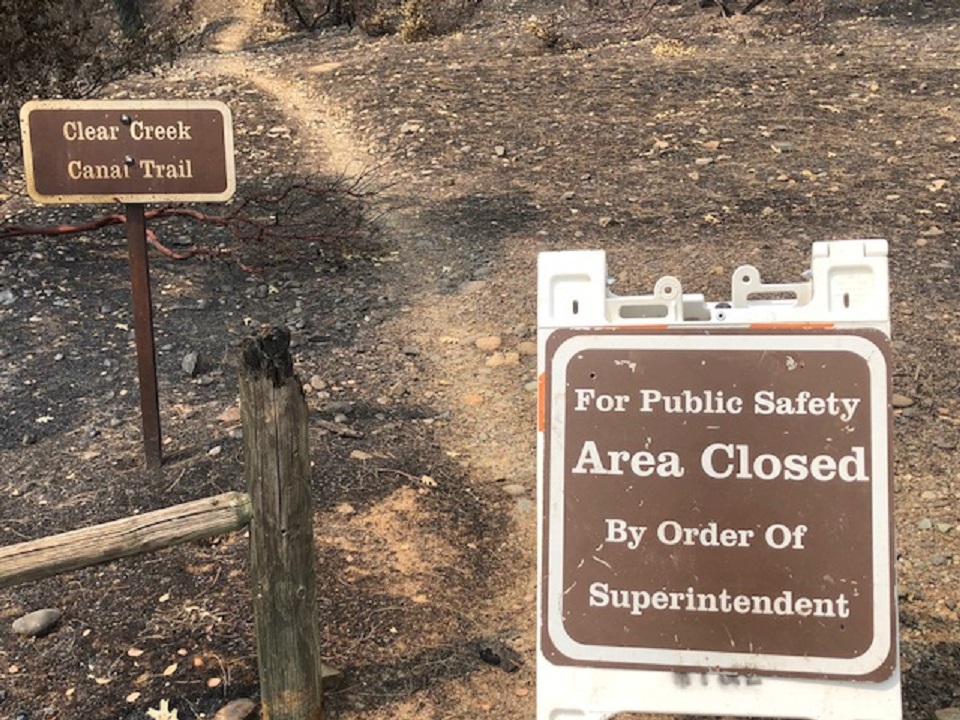 WHIS_ClosedSign Trail sign and temporary closure sign by a trail