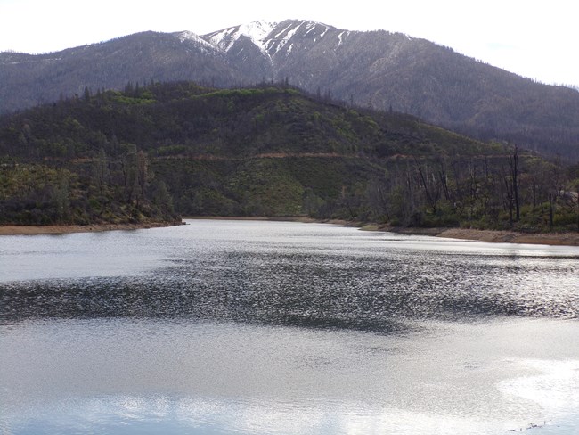 Shasta Bally with coating of snow on top and Whiskeytown Lake.
