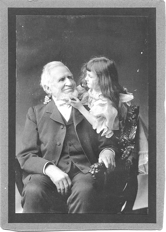Charles Camden and grandaughter Philena Wetmore, circa 1905.
