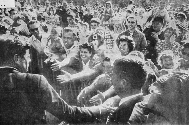 U.S. President John Fitzgerald Kennedy greets the crowd at the dedication of Whiskeytown Dam