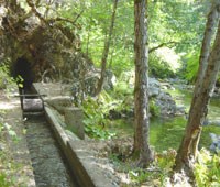 Sluice gate on Crystal Creek Ditch trail.