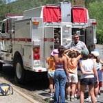 Junior Firefighters learning about Whiskeytown's fire engine.