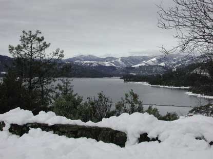 View of lake from Visitor Center with snow.