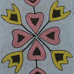 close-up of intricate bead work depicting a stylized flower