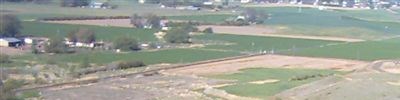 Close-up of area shown in green box. Railroad tracks can be seen.