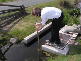 College student uses multiprobe in stream.