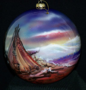 Christmas ornament with Tipi and mountains in view.