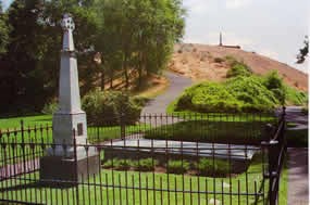 Gray memorial and Great Grave with trail to top of hill in background. Whitman memorial at top of hill. Gray memorial and Great Grave with trail to top of hill in background. Whitman memorial at top of hill.