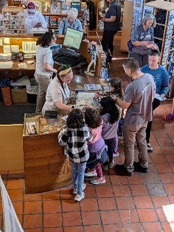 Interpretation Volunteer at the visitor center desk