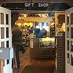 A sign reads “Gift Shop” above the entrance to a store