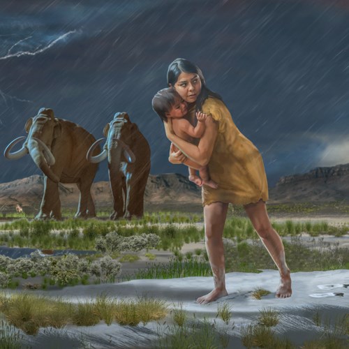 In a scene from the ice age, a woman holding a child on the shores of the ancient Lake Otero leave the footprints in the mud.