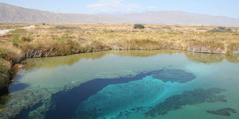 Turquoise blue water in desert. Turquoise blue water in desert.