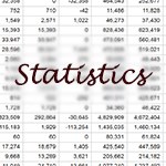 The word “statistics” overlaid on rows of numbers in a grid