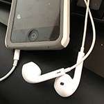 A phone and earbuds