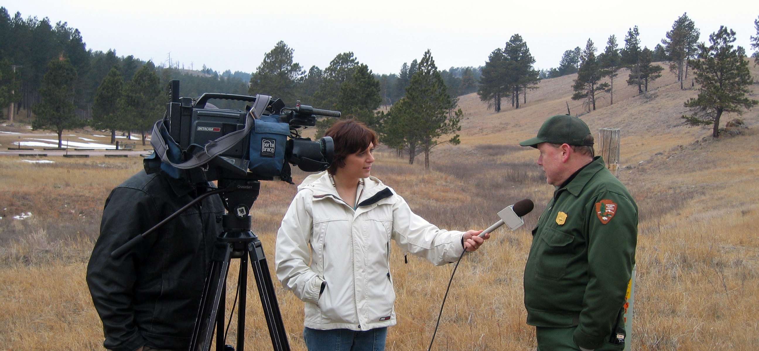 Wind Cave's Park Biologist gives an interview to a television reporter.